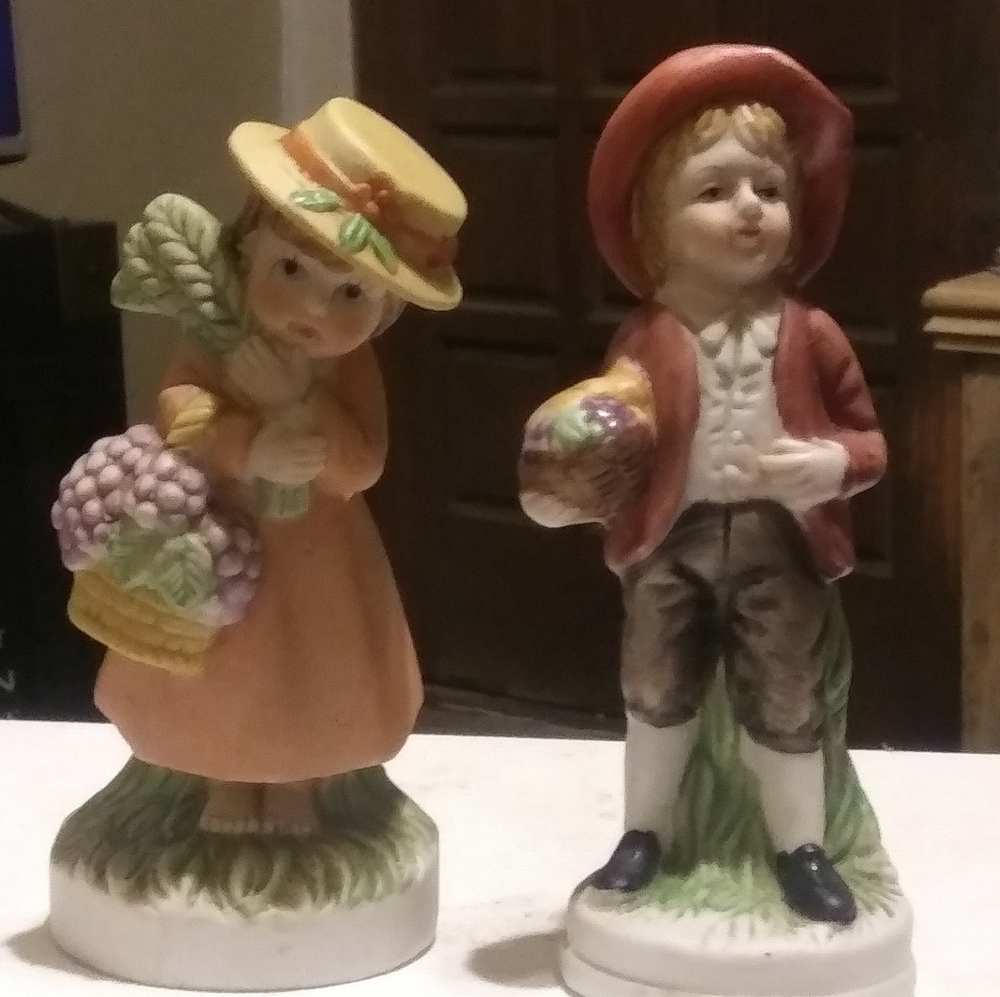 Little boy & girl country figurine